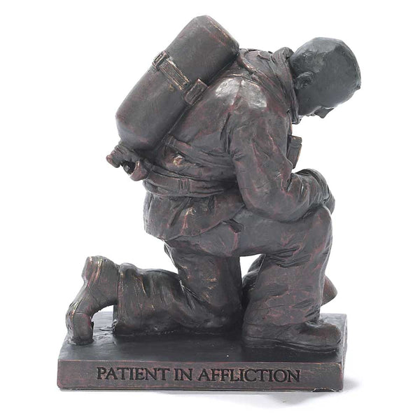 Dicksons Joyful in Hope Praying Firefighter 5 inch Gray Resin Stone Table Top Figurine